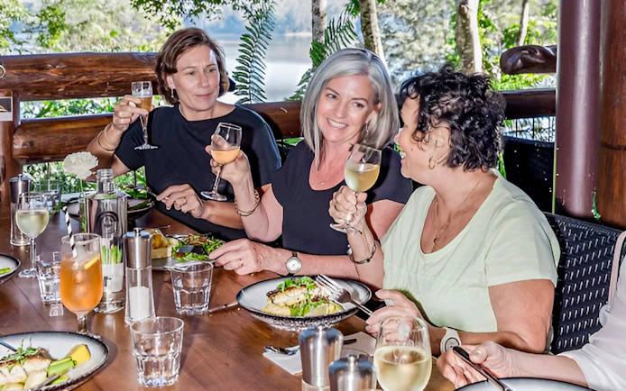 Guests enjoying wine and lunch on a guided tour at Sunshine Coast Hinterland.