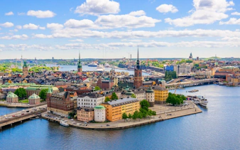Stockholm cityscape with Riddarholmen Church and waterfront, part of The Troll Escape game.