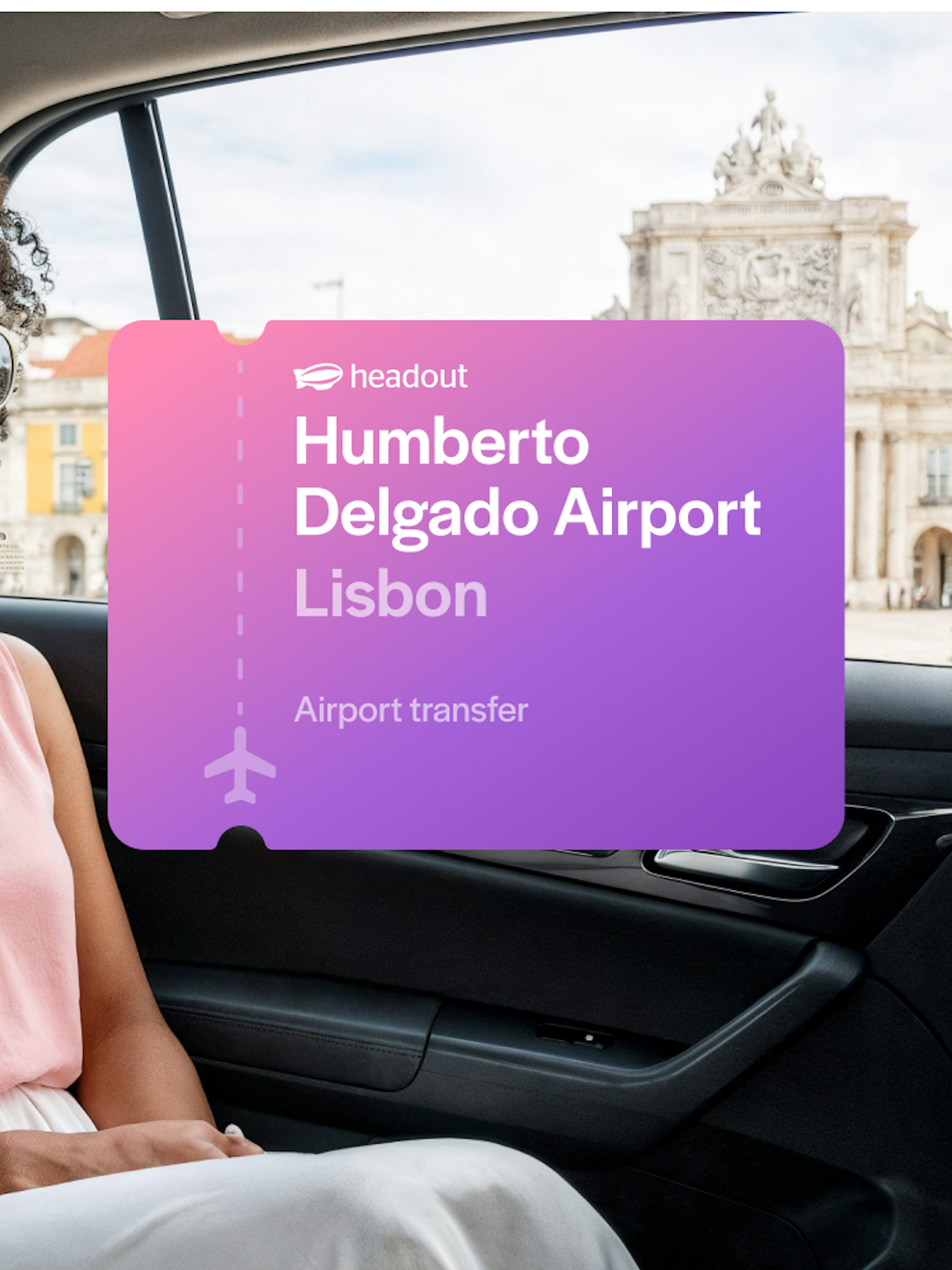 Private car transfer from Humberto Delgado Airport, Lisbon, with view of city landmark.