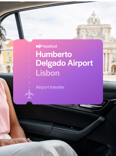 Private car transfer from Humberto Delgado Airport, Lisbon, with view of city landmark.