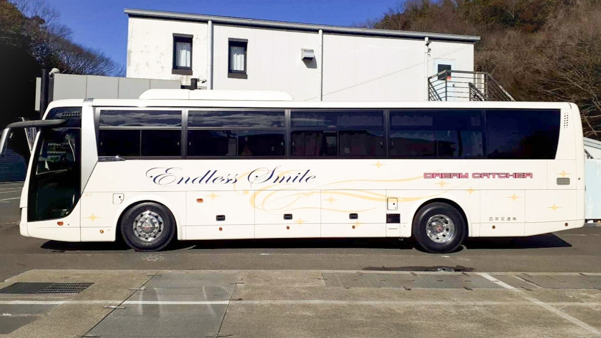 Shinjuku to Tokyo Disney Resort bus parked at station.