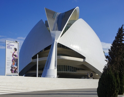Hemisferic building in Valencia, Spain, with its distinctive eye-shaped architecture reflecting in water.