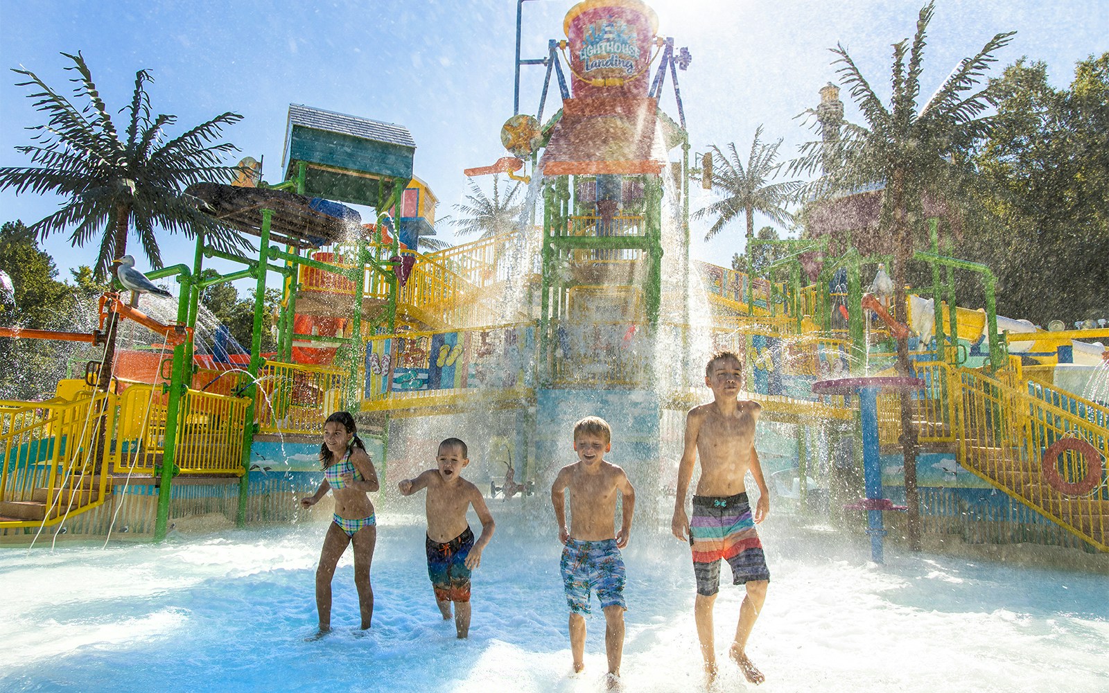 Children playing in water at Lighthouse Landing, Six Flags King's Dominion.