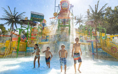 Children playing in water at Lighthouse Landing, Six Flags King's Dominion.