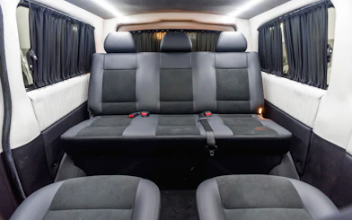 Interior of a private transfer vehicle from New Istanbul Airport with spacious seating.