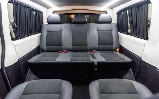 Interior of a private transfer vehicle from New Istanbul Airport with spacious seating.