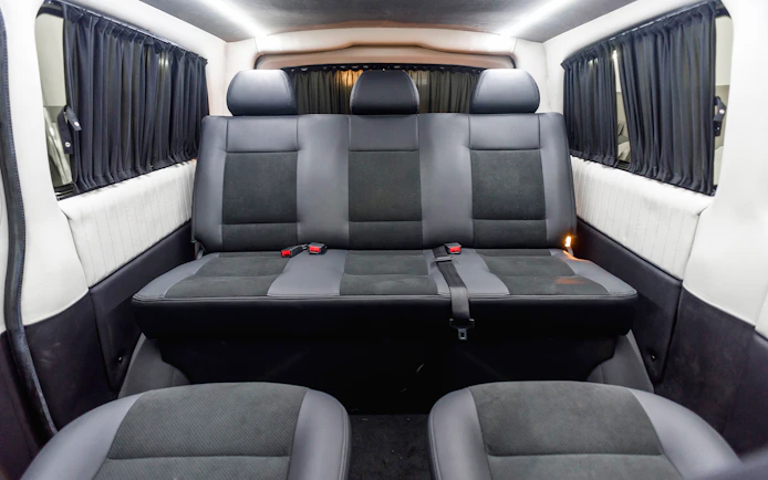Interior of a private transfer vehicle from New Istanbul Airport with spacious seating.