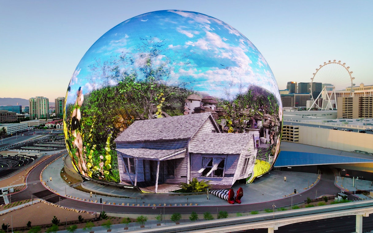 Sphere in Las Vegas displaying Wizard of Oz scene with house and ruby slippers.