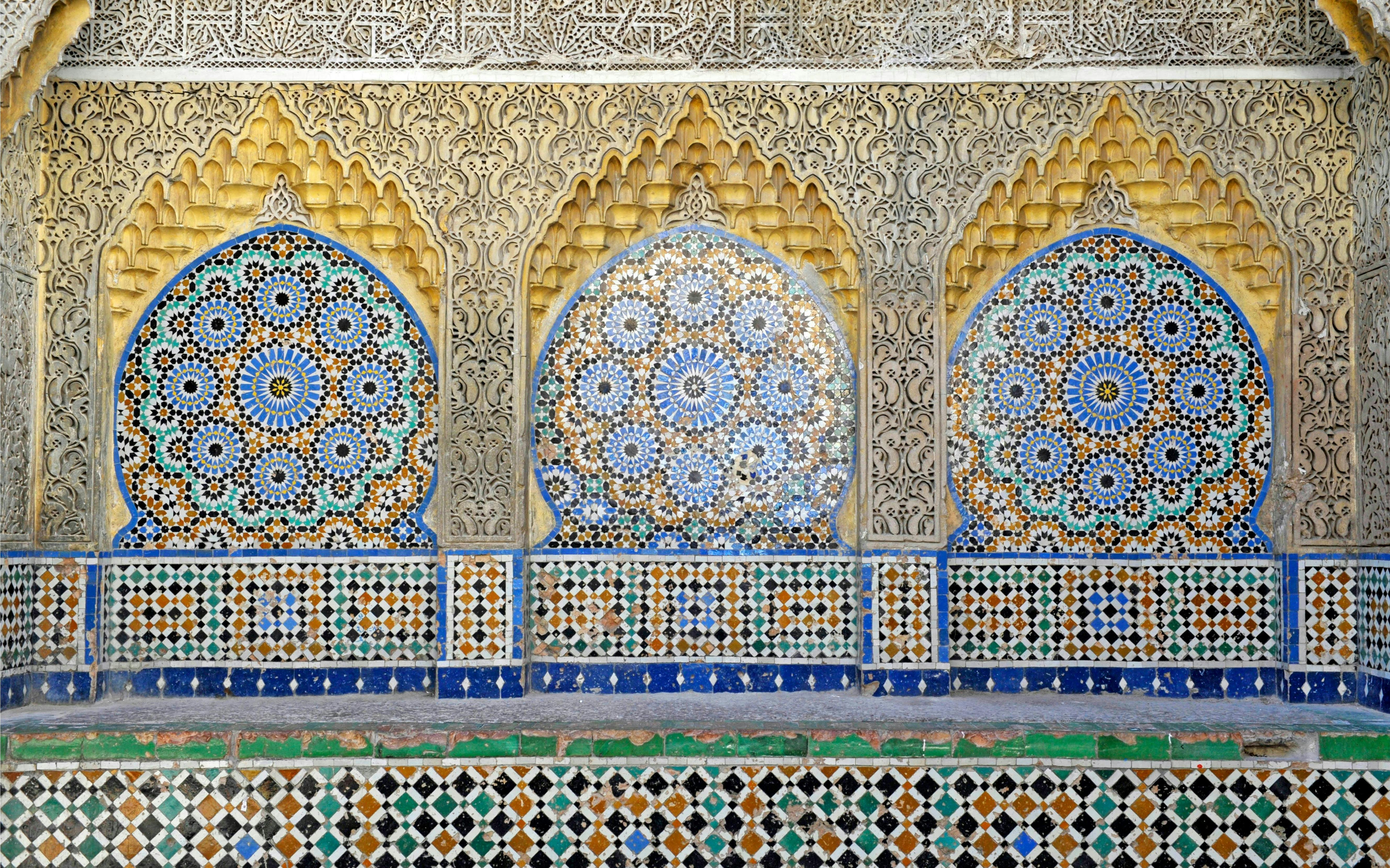 Arabic mosaic patterns in Tanger medina, featuring intricate geometric designs.