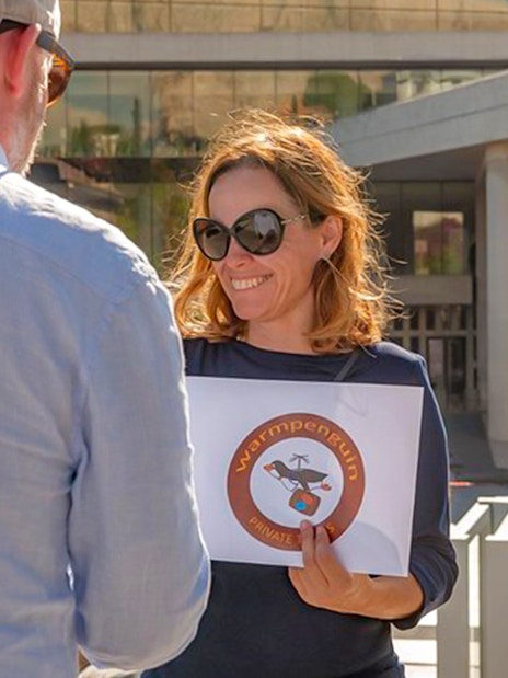 Guide providing information during National Archaeological Museum private tour.