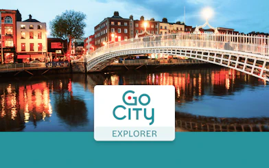 Ha'penny Bridge over River Liffey at dusk, Dublin, Ireland.