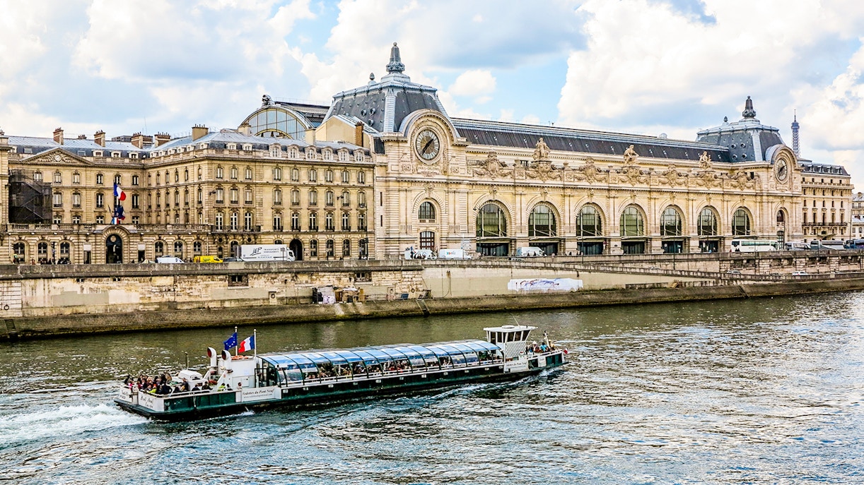 Orsay Museum along the Seine River in Paris, showcasing iconic architecture and riverside views.