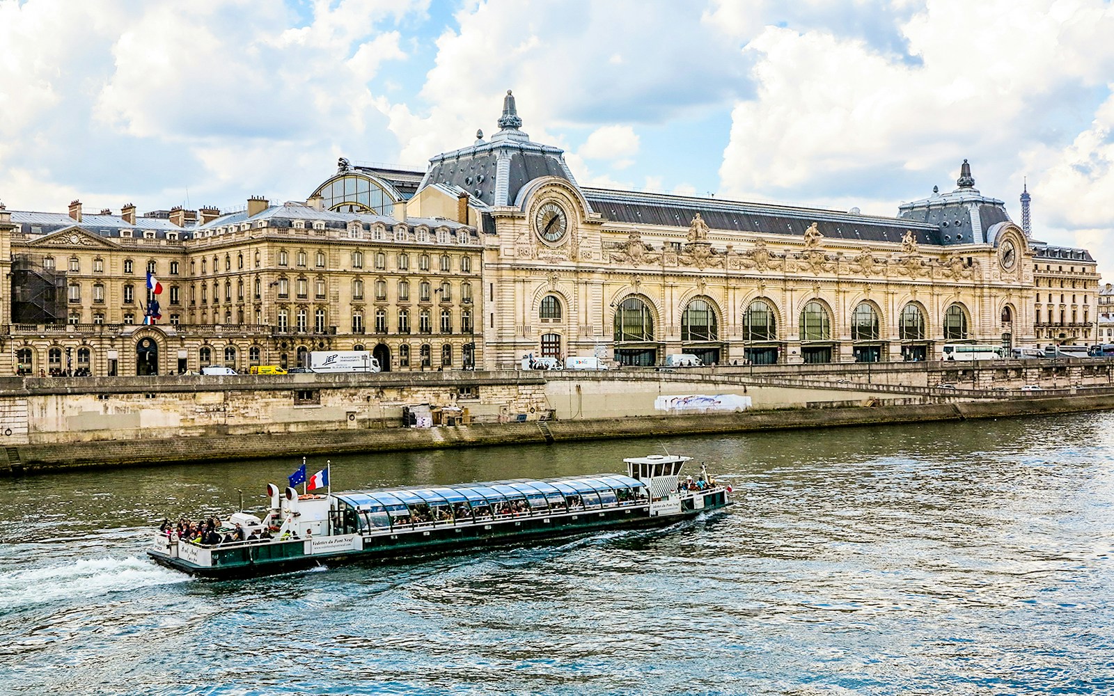 Orsay Museum exterior with clock tower in Paris, showcasing iconic architecture.