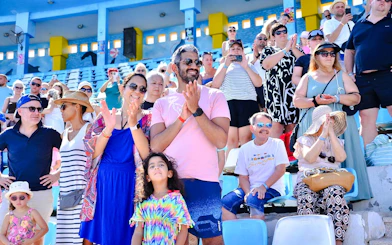 Spectators enjoying a dolphin show at Hurghada stadium.