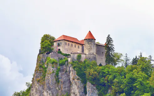 Bled Castle perched on a cliff above Lake Bled, Slovenia.