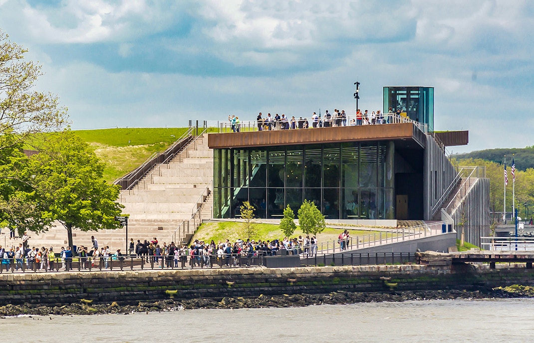 Visitors exploring exhibits at the Statue of Liberty Museum, New York City.