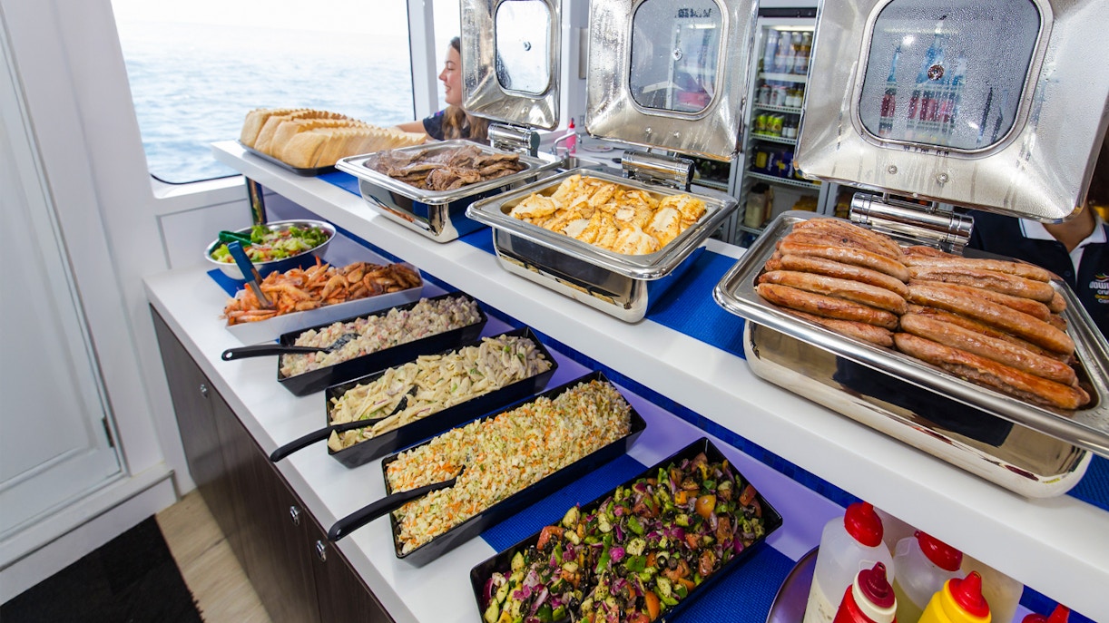 Barbecue buffet lunch on a cruise ship with ocean view during Great Barrier Reef cruise.