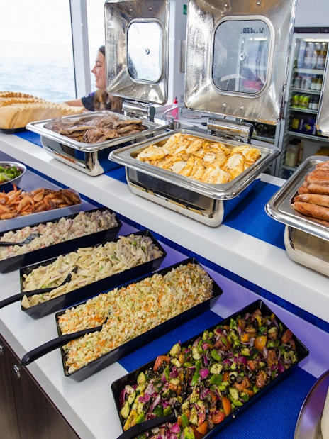Barbecue buffet lunch on a cruise ship with ocean view during Great Barrier Reef cruise.