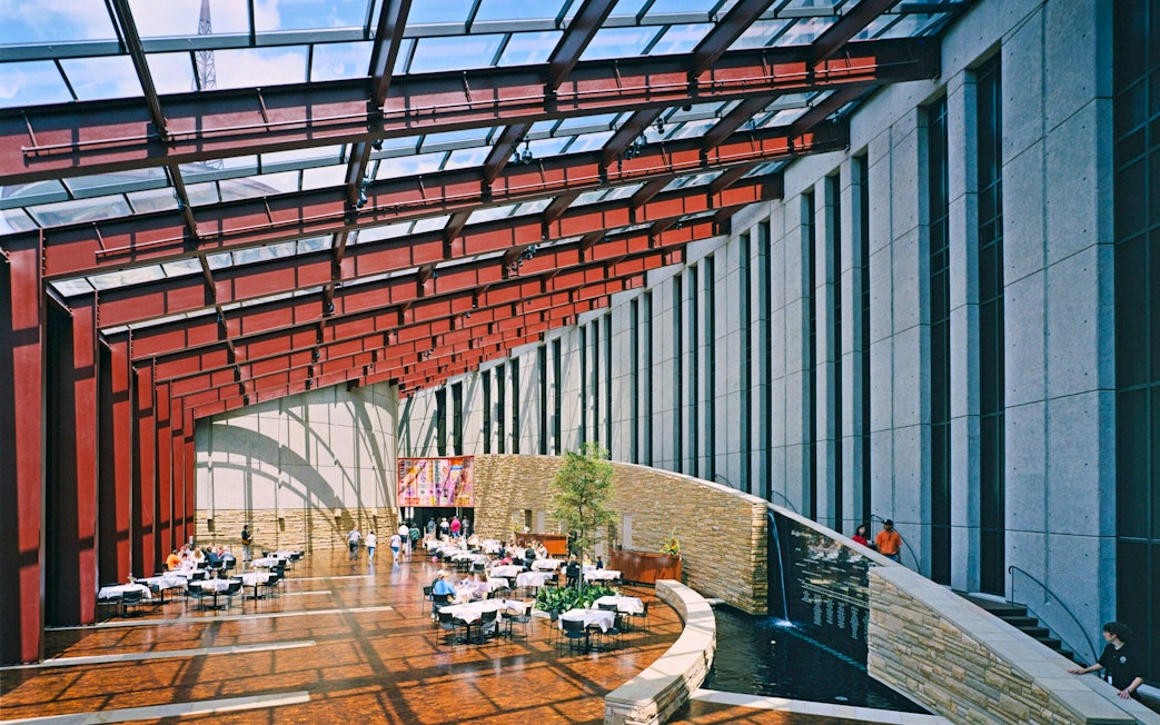 Interior of Country Music Hall of Fame with dining area and modern architecture.