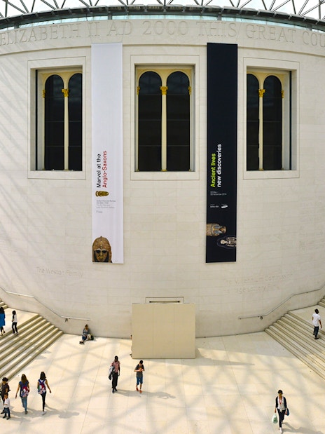 British Museum entrance with visitors, showcasing audio tour and priority access.