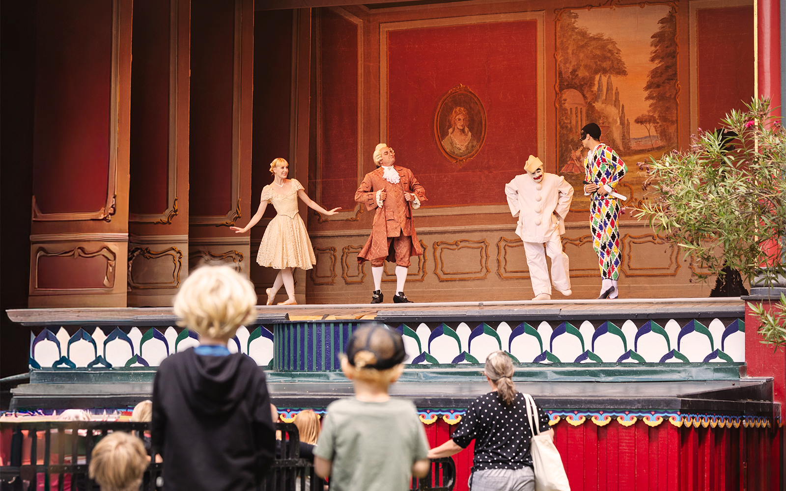 Pantomime performers on stage at Tivoli Gardens, Copenhagen.