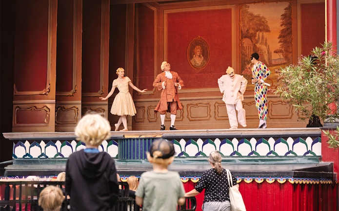 Pantomime performers on stage at Tivoli Gardens, Copenhagen.