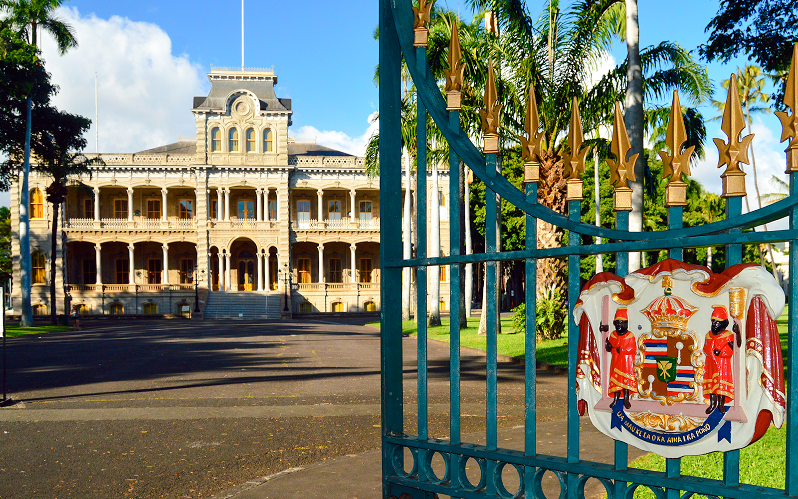 Open gates leading to Iolani Palace, Honolulu, the only royal palace in the United States.
