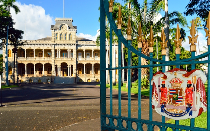 Open gates leading to Iolani Palace, Honolulu, the only royal palace in the United States.