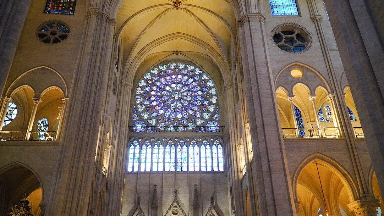 Notre Dame's rose window with intricate stained glass design.