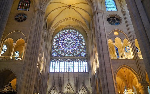 Notre Dame's rose window with intricate stained glass design.