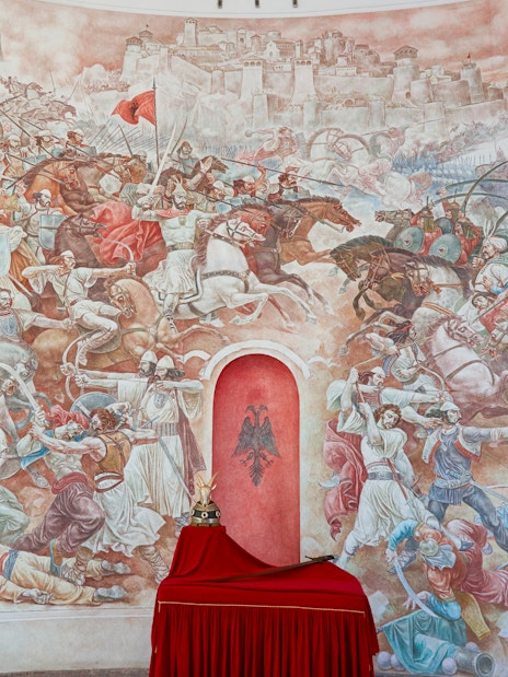 Battle mural at Skanderbeg Museum, Kruje Castle, Albania depicting historical scenes.