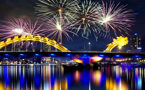 Fireworks over Dragon Bridge during Da Nang International Fireworks Festival.