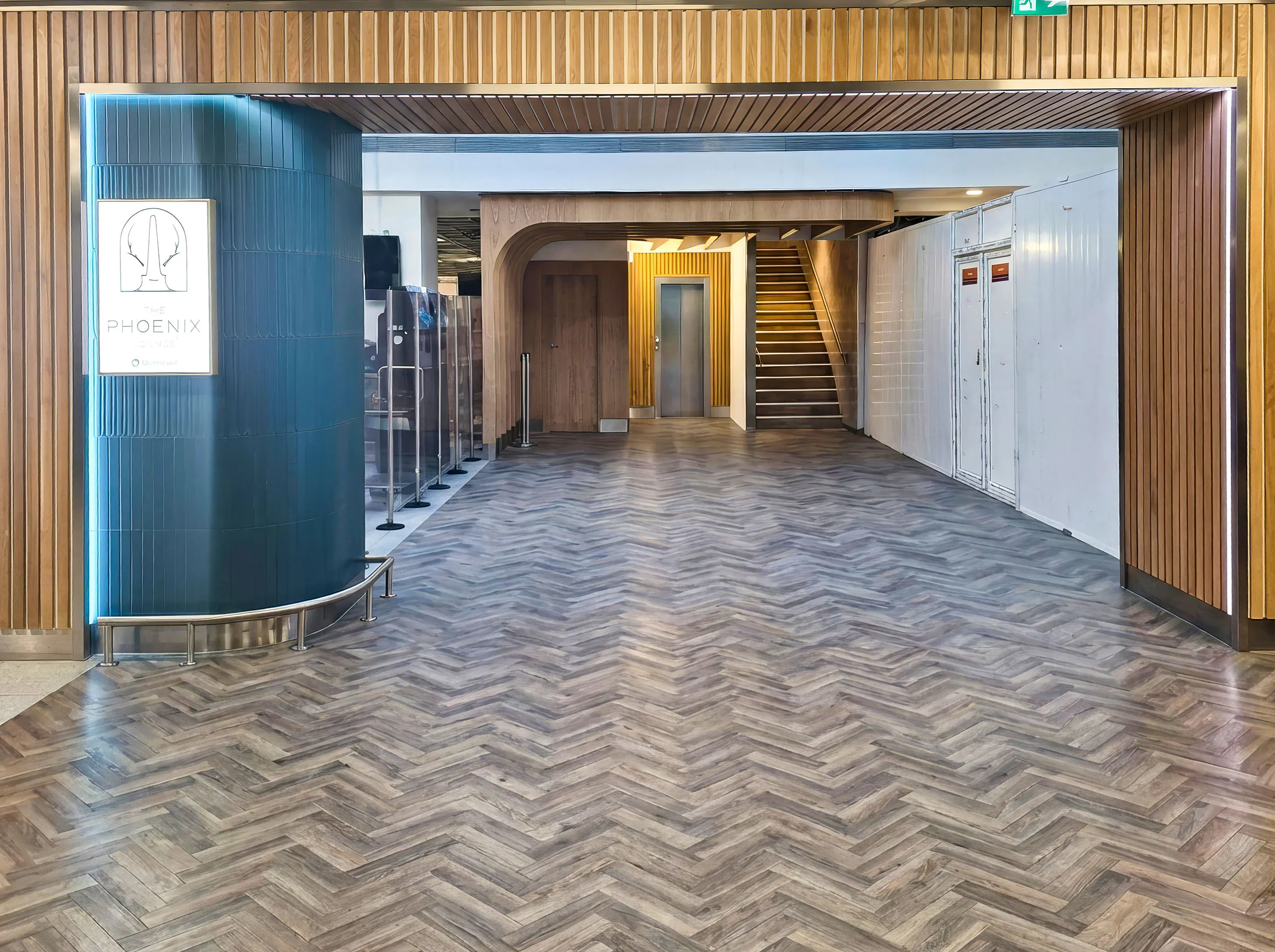 Phoenix Lounge entrance at Dublin Airport Terminal 1 with modern wood design.