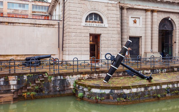 Museo Navale entrance with anchor and cannon in Cinque Terre, Italy.