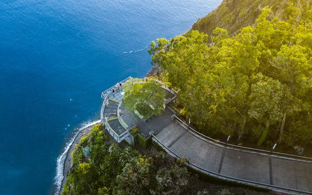 Aerial view of Cabo Girão skywalk overlooking the ocean in Madeira.