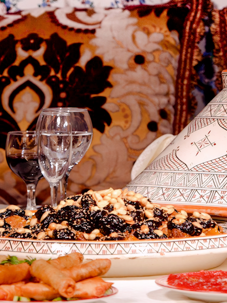 Traditional Moroccan tagine with nuts and dried fruits at Dar Essalam dinner show.