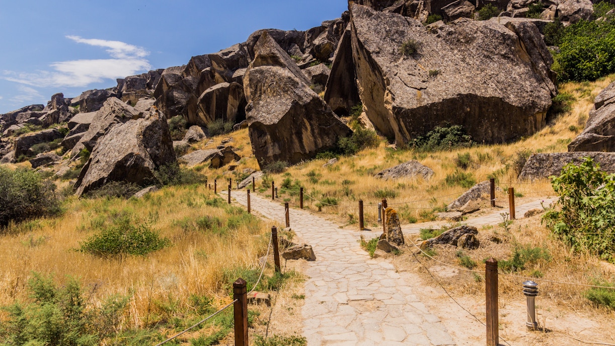 Pathway through rocky terrain in Gobustan petroglyph reserve, Azerbaijan.