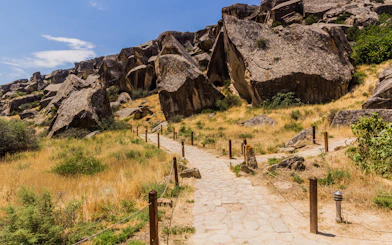 Pathway through rocky terrain in Gobustan petroglyph reserve, Azerbaijan.