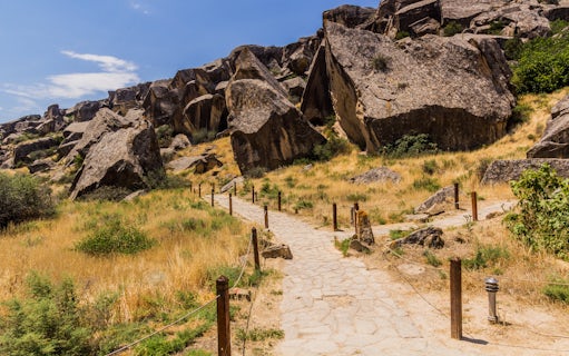 Pathway through rocky terrain in Gobustan petroglyph reserve, Azerbaijan.