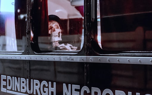 Skeleton in a top hat on Edinburgh Ghost Bus Tour.