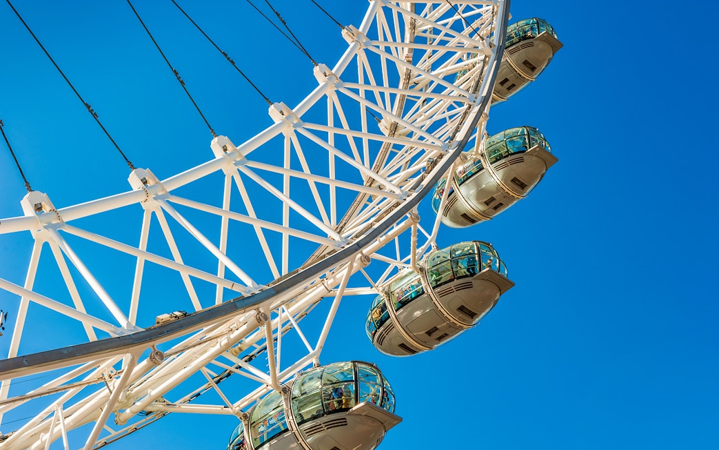 London Eye capsules against a clear blue sky.