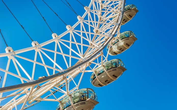 London Eye capsules against a clear blue sky.