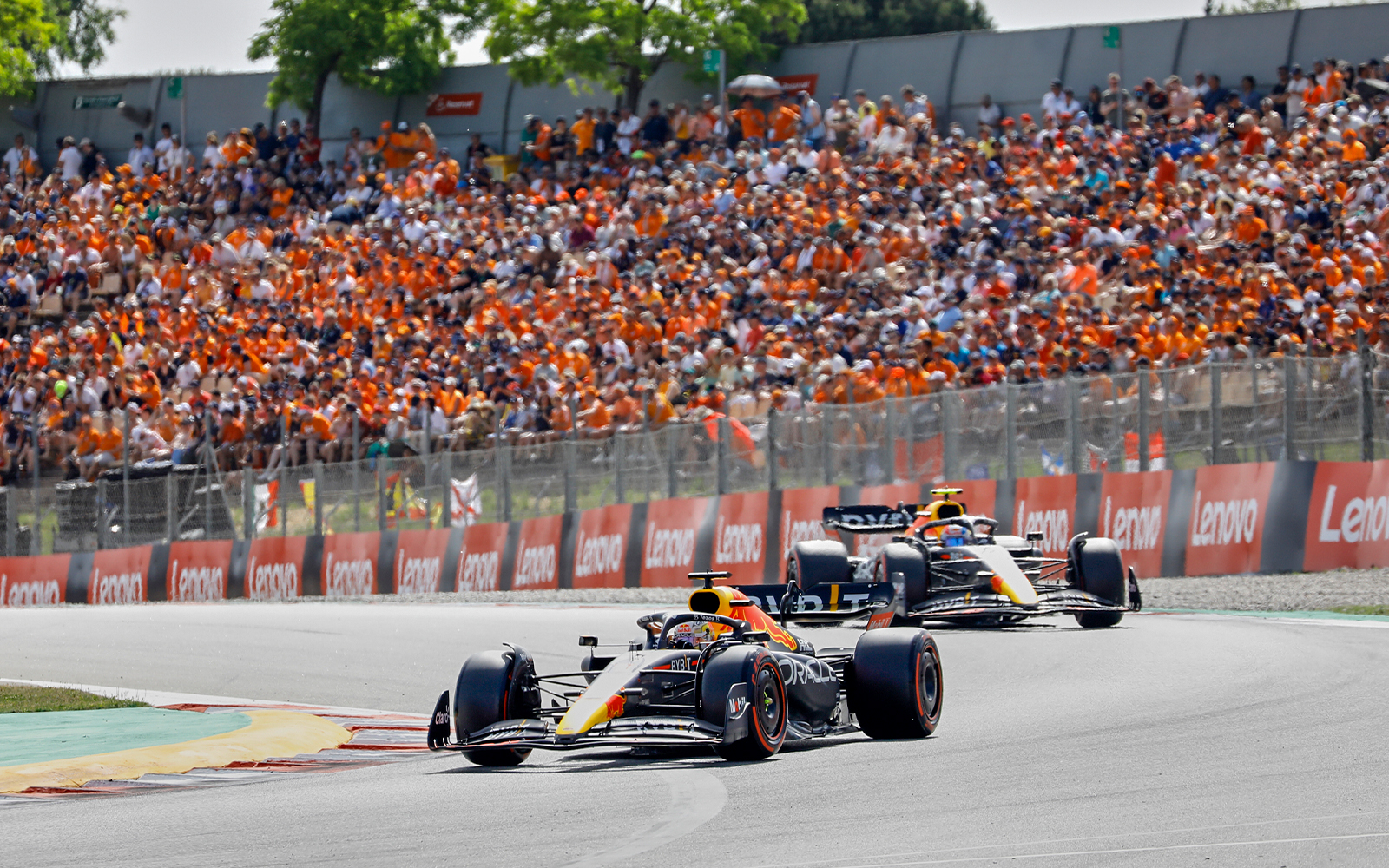 Barcelona Formula 1 cars racing on the track during a 3-day pass event.