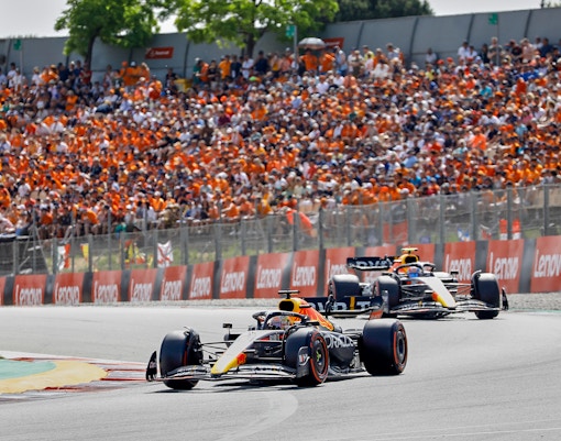 Barcelona Formula 1 cars racing on the track during a 3-day pass event.