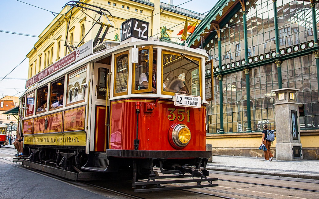 Historic tram on a street in Prague during a 24-hour hop-on hop-off tour.