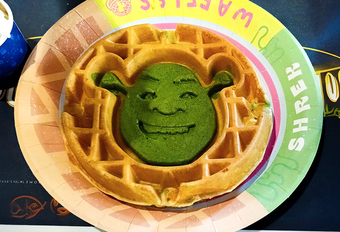 Shrek-shaped waffle on a plate