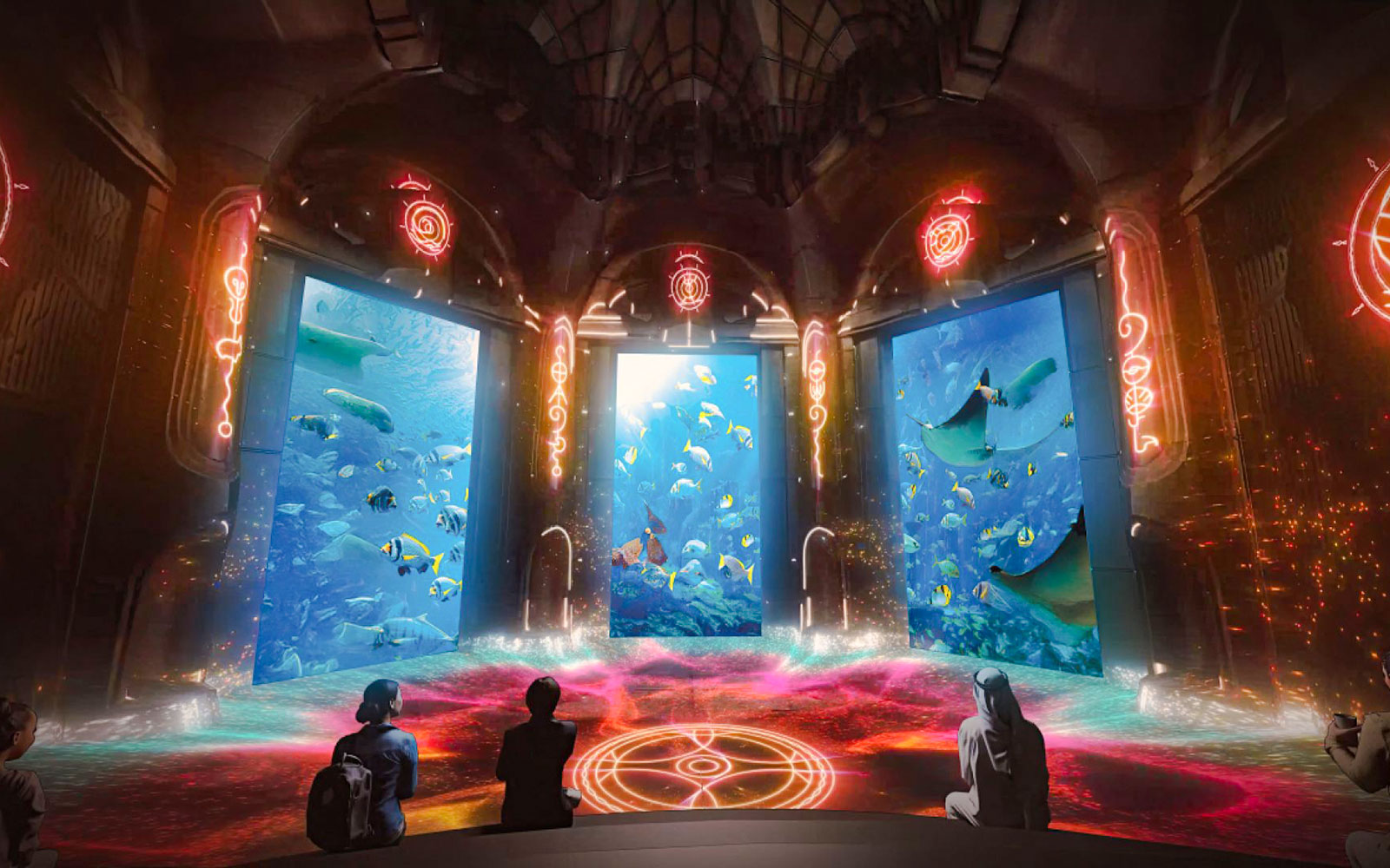 Underwater scene at The Lost World Aquarium with diverse fish and rays.