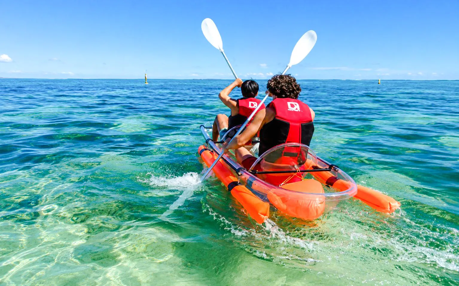Transparent kayak on clear waters in Flic en Flac, Mauritius.