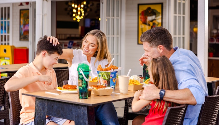 Kenny's Fried Chicken restaurant at Dreamworld, Gold Coast, with patrons dining.