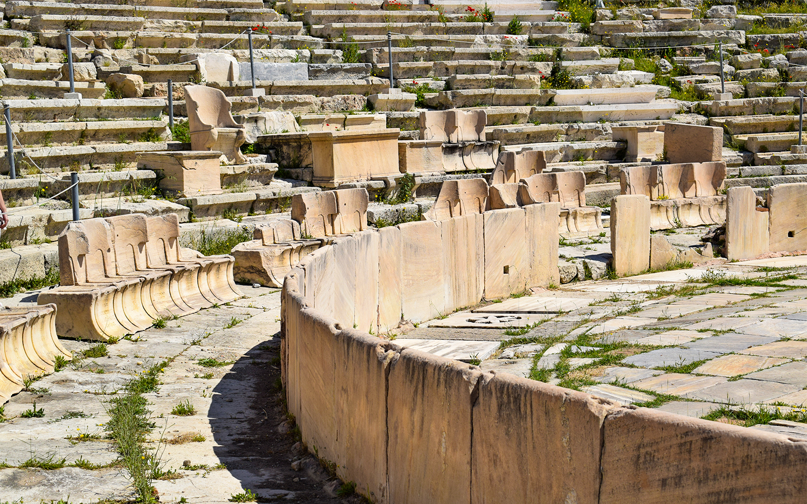 Marble seats in the first row of the Theatre of Dionysus at the Acropolis, Athens, Greece.